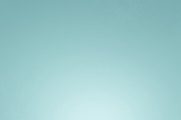 Electric blue background with stains. Light is coming from bottom