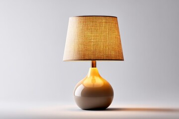 A light beige table lamp with a linen shade.