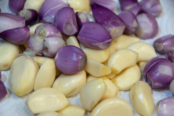 Photographed, a mix group of peeled shallots (Allium cepa, 