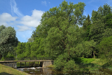 Black Bridge-dam over Slavyanka river in Pavlovsk park, Pavlovsk, suburb of Saint Petersburg, Russia