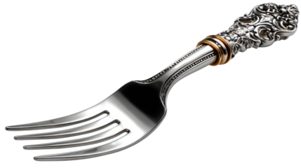 Exquisite Silverware: A detailed photograph captures the elegance of an ornate silver fork, displaying its intricate design and fine craftsmanship.