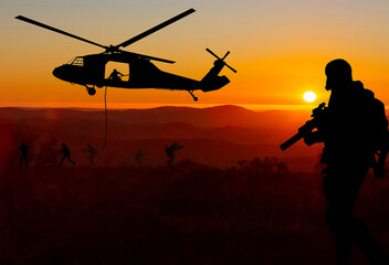 Conceptual image of war with sunset and soldier silhouette