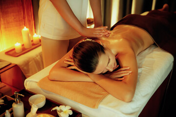 Caucasian woman customer enjoying relaxing anti-stress spa massage and pampering with beauty skin...
