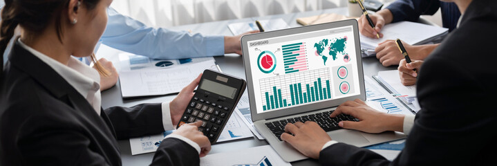 Business intelligence and data analysis concept. Analyst team working on financial data analysis...
