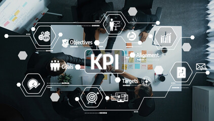 Business Team Collaboration on Strategic Objectives and Performance Metrics with Visual...