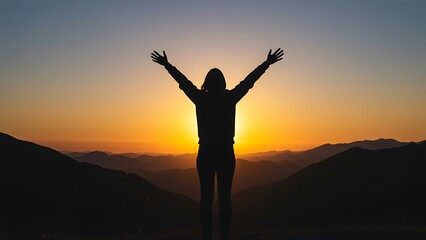 Fototapeta premium woman celebrating success with arms raised at sunset