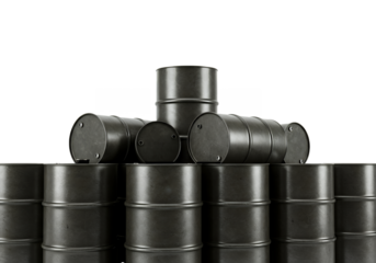 Stacked metal barrels some standing some lying down against a black background with reflective surface