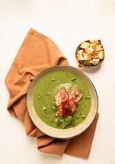 green mashed soup, with bacon and croutons, homemade, no people,