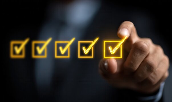 Businessman checking task completion on checklist for project management progress tracking