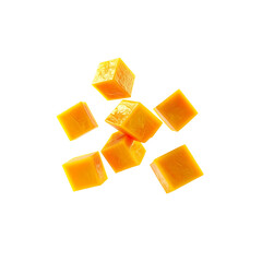 Delicious fresh mango cubes flying randomly on transparent background