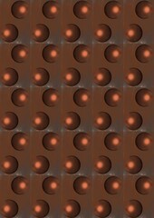Abstract pattern of brown spheres on textured surface  