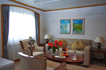 Luxurious suite stateroom cabin room onboard luxury cruise ship cruiseship yacht liner with bedroom...