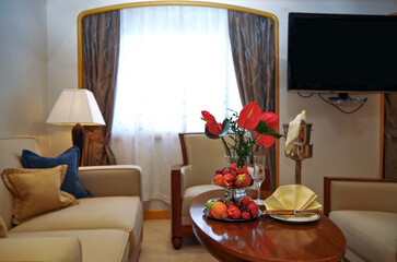 Luxurious suite stateroom cabin room onboard luxury cruise ship cruiseship yacht liner with bedroom...