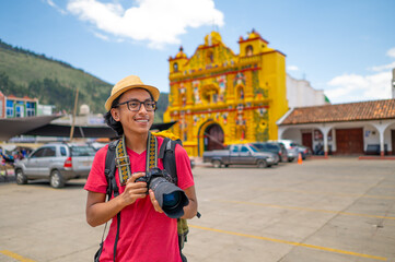Latin American tourist explorer visits colonial cities in Guatemala.