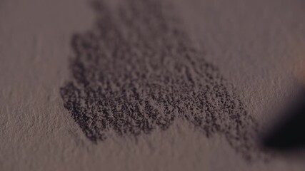 Shading with a pencil close up - Powered by Adobe