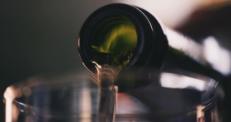 Pouring a glass of wine close up - Powered by Adobe