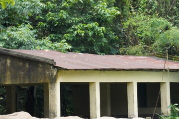 The shade of the old building is corrugated metal sheets