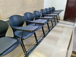 Set of Chairs placed mannerly in the classroom