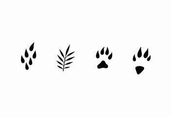 Fototapeta premium Black silhouette nature elements including leaves and paw prints 