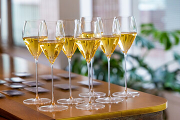 Set of white wine glasses on a table
