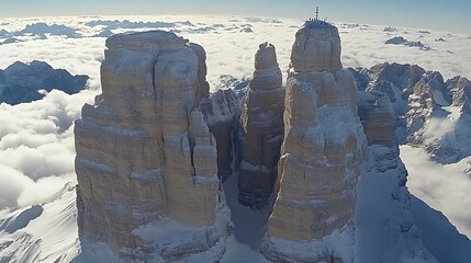 Aerial view of majestic snow-capped mountain peaks.