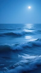 Fototapeta premium Serene night scene of gentle waves under moonlight.
