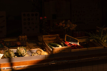 Indoor stall at the La Rochelle farmers' market with a variety of organic vegetables.