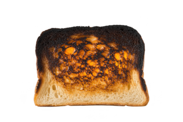 A slice of white bread that is heavily burnt and charred on one side isolated on transparent background