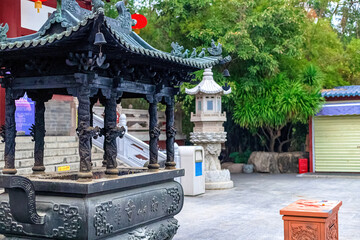 Hainan Island, Sanya: Nanshan Buddhist Center. View of the incense burner in front of the Temple