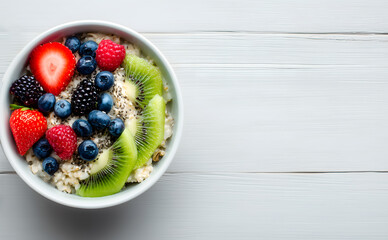 Colorful Healthy Breakfast Bowl Topped with Fresh Fruits and Seeds