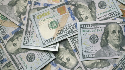 A Stack of U.S. Dollar Bills Showcased on a Flat Surface for Financial Analysis and Transactions