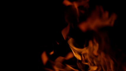 The Captivating Flames are Dancing Mysteriously in the Embracing Darkness of Night