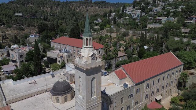  Franciscans catholic Church of Saint John the Baptist in Ein Karem village ,outskirts of Jerusalem at day time,  Aerial view video footage (circle mode)