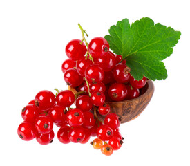 Red currant isolated on white background. Redcurrant or Ribes rubrum ripe berries with green leaves in wooden bowl.