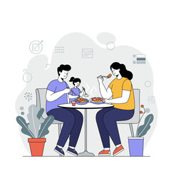 Family enjoying meal together at table with plants around  