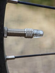 a close-up of a bicycle valve