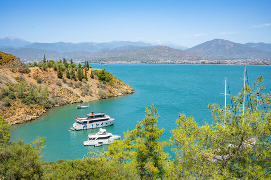 Boncuk Bay, Blue Lagoon and Oludeniz beach aerial panoramic view. Oludeniz is a beach resort in the Fethiye district of Mugla Province, Turkey.