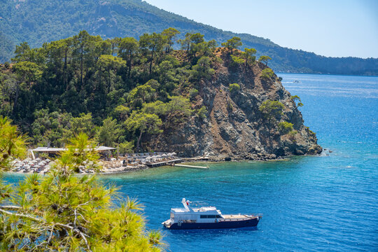 Boncuk Bay, Blue Lagoon and Oludeniz beach aerial panoramic view. Oludeniz is a beach resort in the Fethiye district of Mugla Province, Turkey.