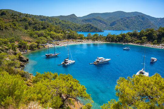 Boncuk Bay, Blue Lagoon and Oludeniz beach aerial panoramic view. Oludeniz is a beach resort in the Fethiye district of Mugla Province, Turkey.