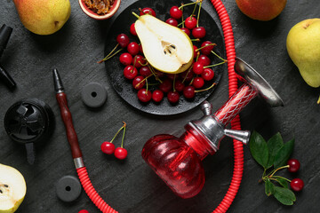 Hookah and fresh fruits on black table, flat lay