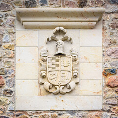 Family Crest on Stone Wall