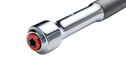 Close up of a chrome ratchet wrench with a red insert on a black background in studio lighting