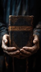 Ancient Book in Weathered Hands: A Testament to Time