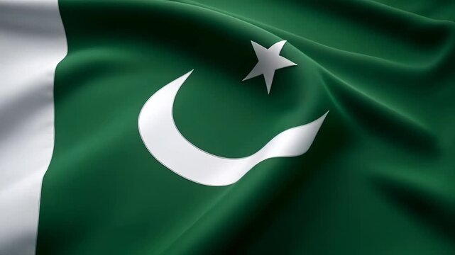 Close up view of the  national Pakistan flag with a white crescent moon and a five pointed star