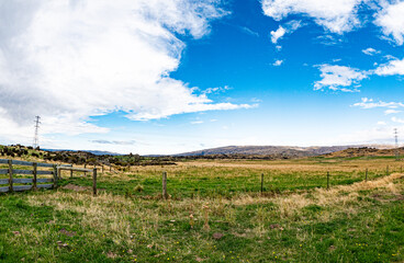 Central otago new zealand rural scene landscape hills mountains wide vista scenic beautiful