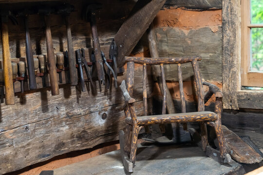 A rack of woodworking tools in a carpenter's shed - Powered by Adobe