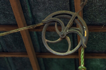 An iron pulley with a rope 