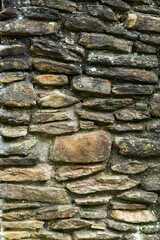 A old stone chimney wall