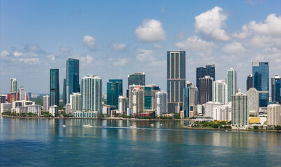Obraz premium Aerial view of Brickell skyscrapers. Modern cityscape of downtown Miami. Panoramic Miami skyline above the coastline.