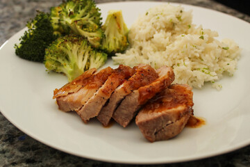 Plated Sweet Thai Chili Pork with Zesty Rice and Roasted Broccoli